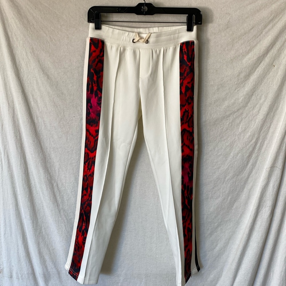 Pam & Gela White Cropped Track Pants with red/black print sides